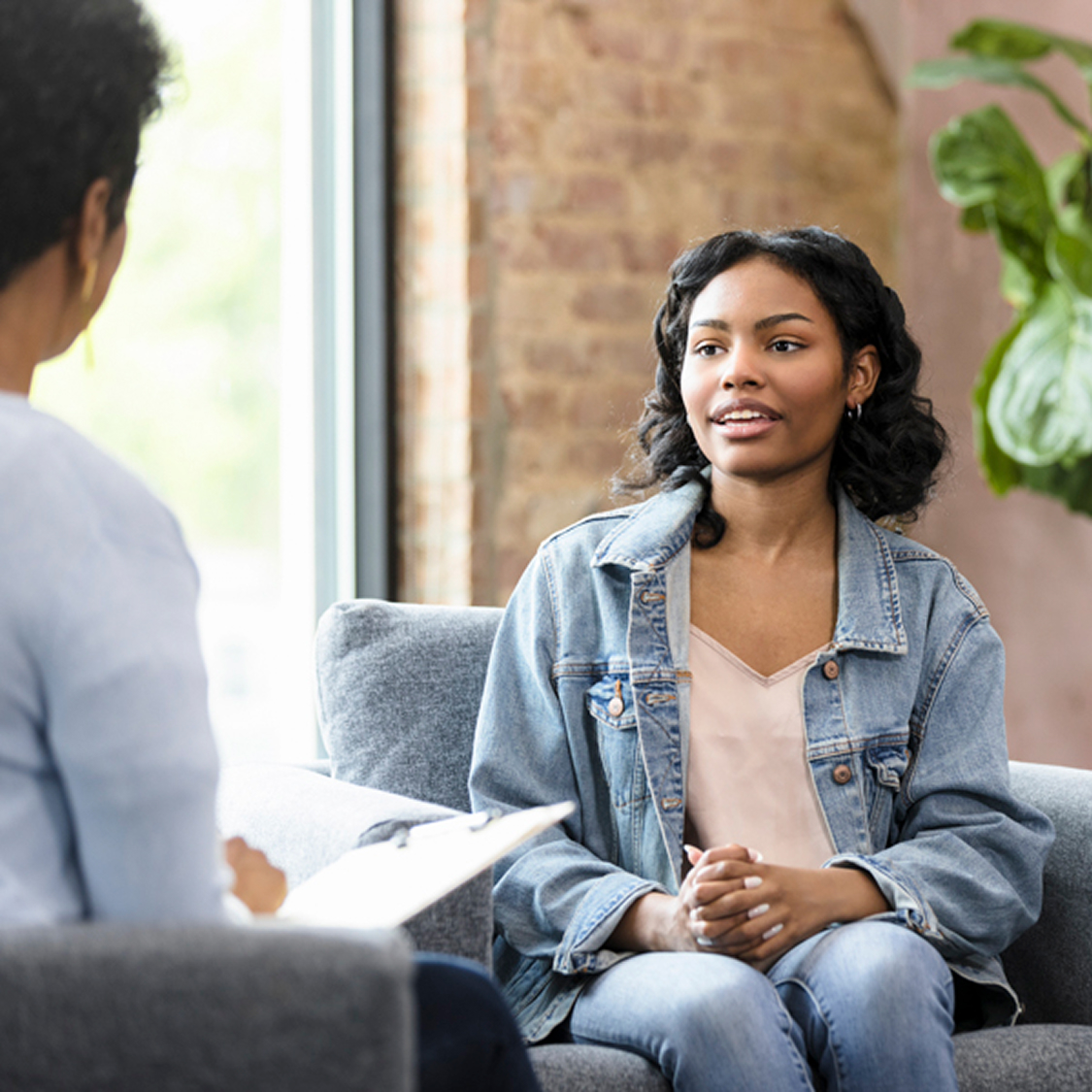 A counselor talking with a young person